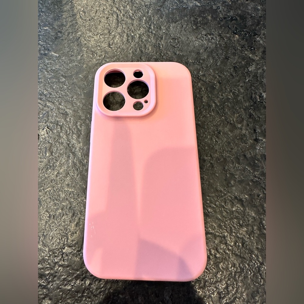 Pink silicone IPhone 14 Pro case with MagSafe